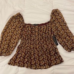 Cute ribbed 70’s style print blouse